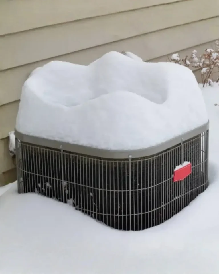 HVAC Unit Covered With Snow From Spring Storm
